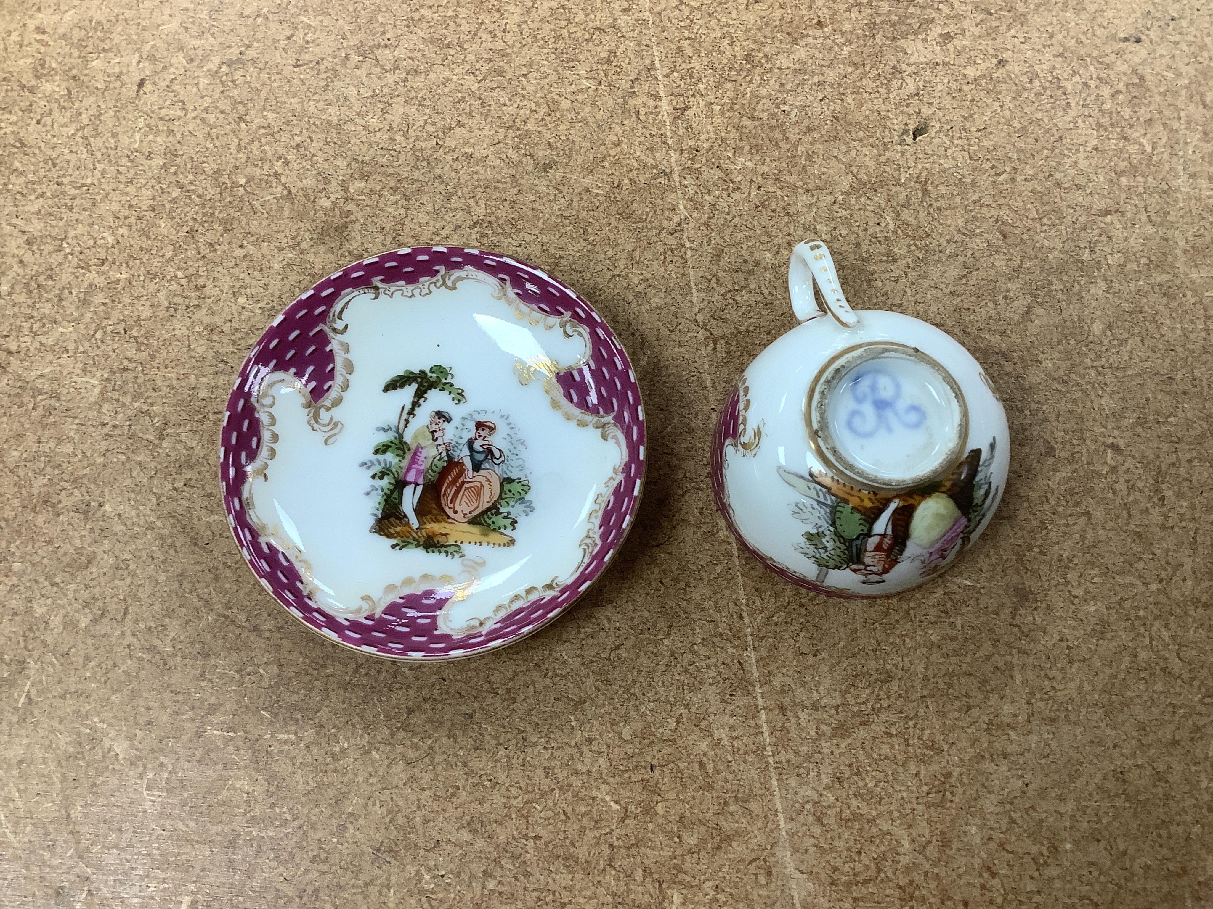A group of 19th/20th century German porcelain, comprising a Nymphenburg pug, seven Dresden miniature cups and saucers and a Meissen bottle, largest 13cm high